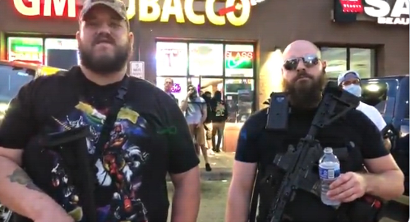 Minneapolis Armed Men Protect Store