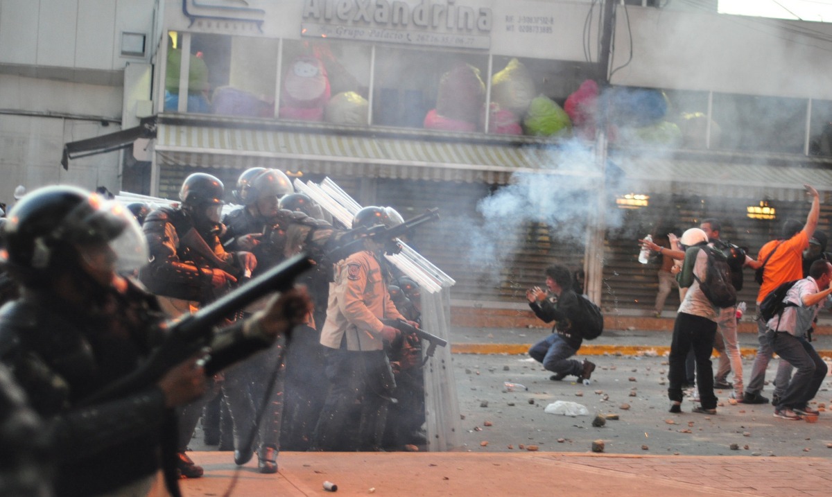 Venezuelan police firing tear gas at students