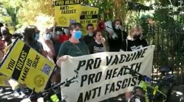 Antifa Group Demands More Government COVID Regulations At Anti-Mandate Protest