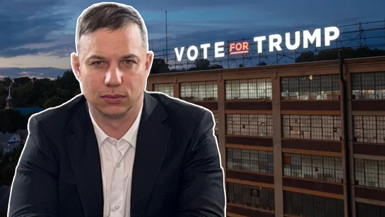 Anthony Constantino in the foreground with a photo of a Sticker Mule factory with a lighted "Vote for Trump" sign atop.